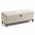 Panca contenitore in tessuto beige con gambe in legno